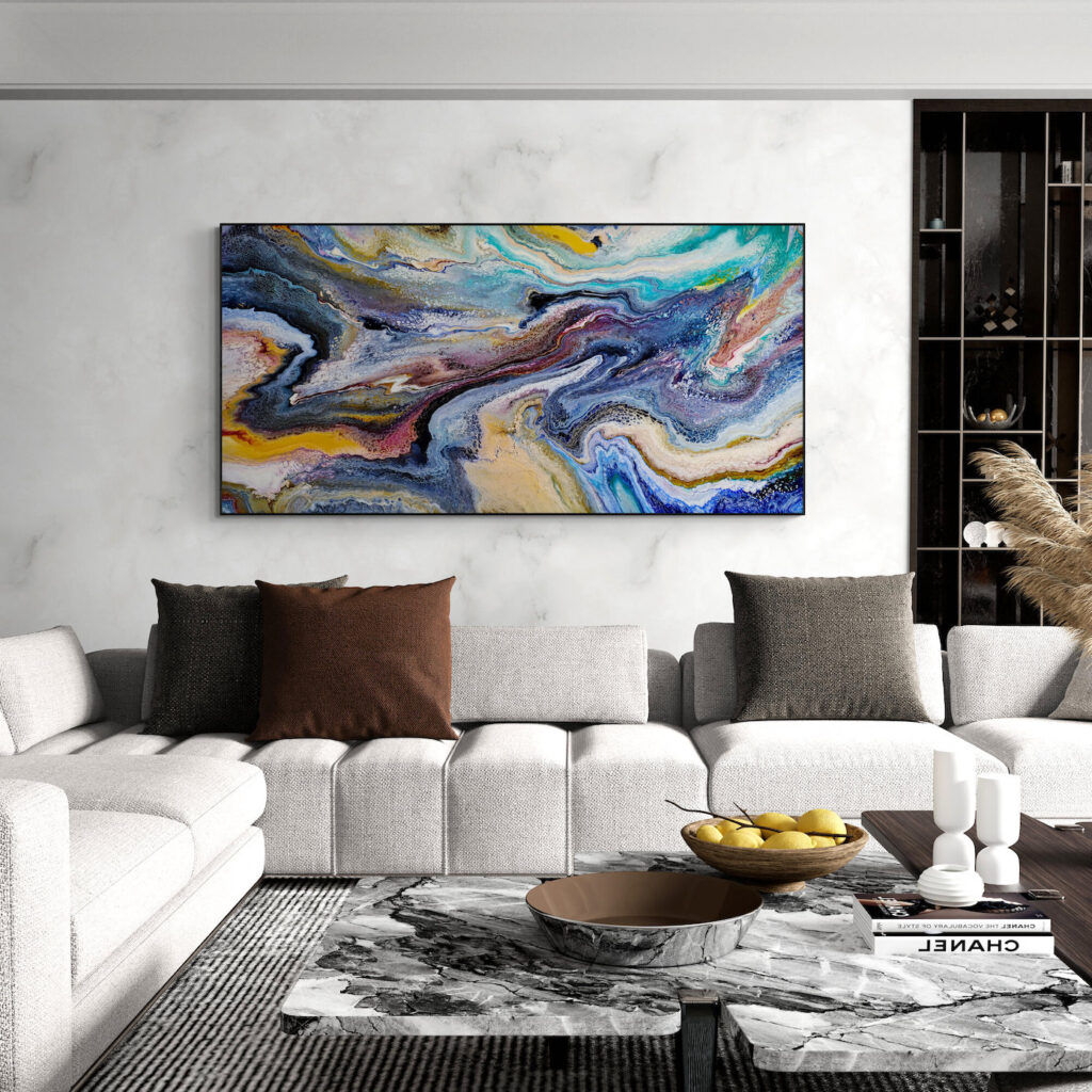 An Marvellous World painting hangs above a white couch in a living room. Abstract Art by Thanh Lyons