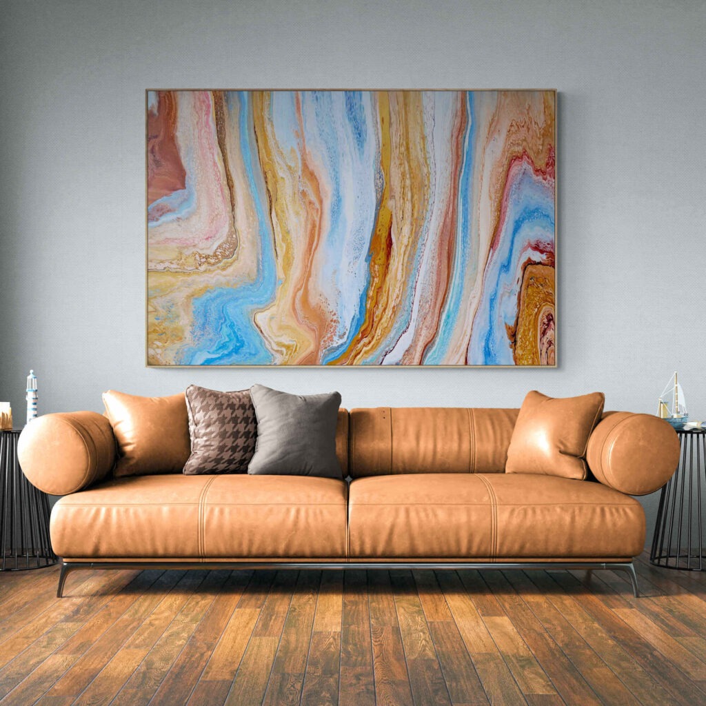 Infinite Canyon painting hangs above a leather couch in a living room. Abstract Art by Thanh Lyons
