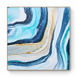 Crystal Cascade (101 x 101 cm) - Framed in oak painting with swirling patterns of blue, white, and gold, displayed on a wall. Abstract Art by Thanh Lyons