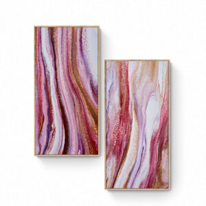Abstract artwork featuring two rectangular panels with swirling patterns in shades of pink, purple, gold, and white, set against a plain white background. This Blushing Sands diptych - framed - 90 x 90 cm adds an elegant touch to any space. Abstract Art by Thanh Lyons