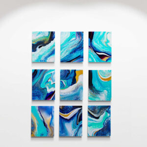 A 3x3 grid of vibrant abstract paintings from the Ocean Adventure series (30 x 40 cm), featuring swirling blue, white, and yellow patterns, displayed on a pristine white wall. Abstract Art by Thanh Lyons