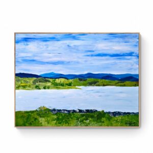 The framed artwork "Spring is here (80 x 105 cm - Framed) (Copy)" captures the serene beauty of spring, featuring a large body of water in the foreground, surrounded by green fields and distant blue mountains under a partly cloudy sky. Abstract Art by Thanh Lyons