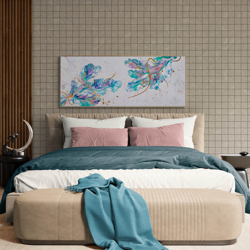 A neatly made bed with pink and teal bedding, a blue throw blanket, and a cushioned bench at the foot. A colorful abstract painting named "Spring Swings - Framed - 64x155 cm" hangs on the tiled wall above the bed. Abstract Art by Thanh Lyons