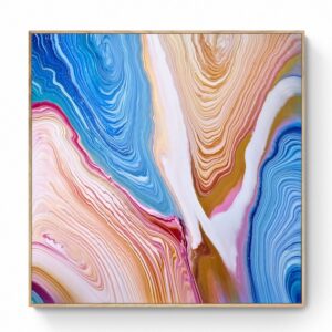 Emerald Dance (101 x 101 cm) - Framed in Black" is an abstract painting that features a blend of swirling vibrant colors such as blue, pink, and gold, creating a stunning marbled effect within a square frame. Abstract Art by Thanh Lyons