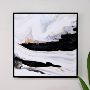 The Formation," an abstract painting with swirling black, white, and gold patterns measuring 80 x 80 cm and framed in raw oak floater, hangs against a light wall with a partially visible green plant at the bottom right. Abstract Art by Thanh Lyons